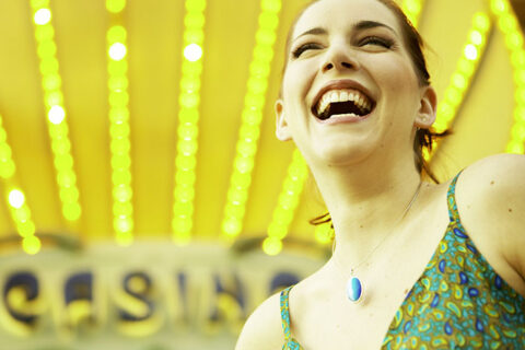 Woman smiling outside a casino